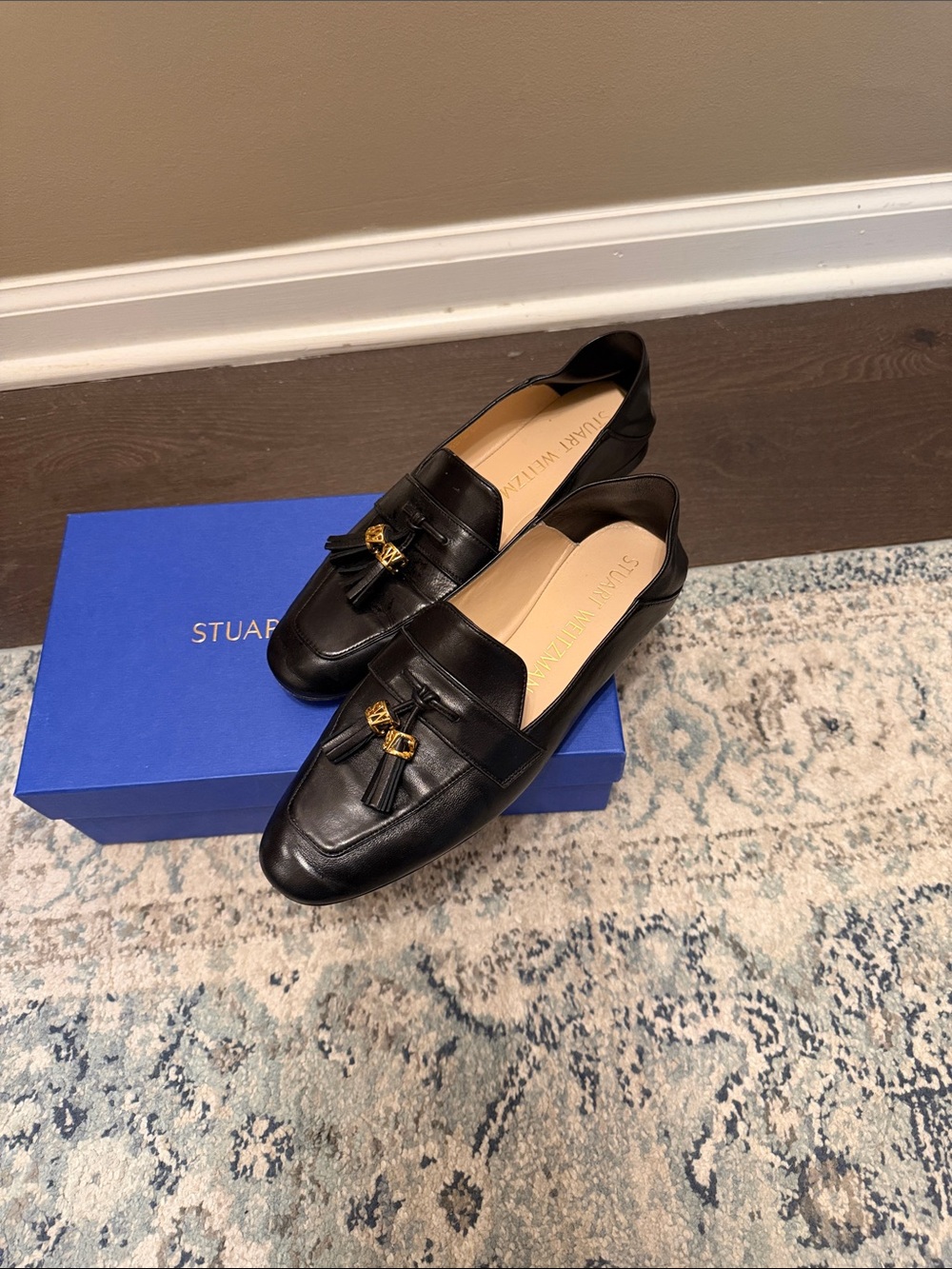 Stuart Weitzman Black Leather Tassel Loafers with Gold Hardware